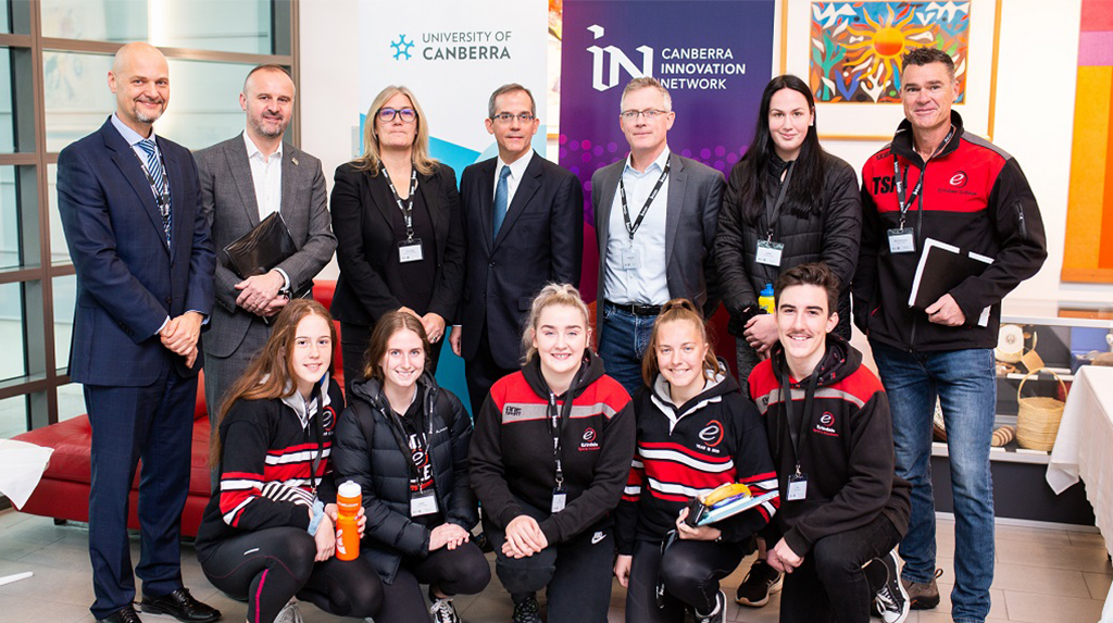 Group shot of CBRIN, ACT Gov., US Embassy, and local high school students at the SportsTech Day.