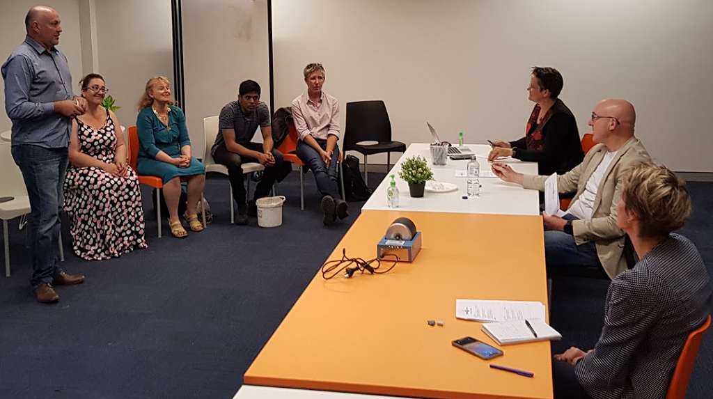 Team pitching in front of judges
