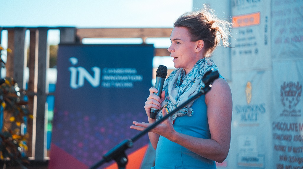 Woman pitching at event