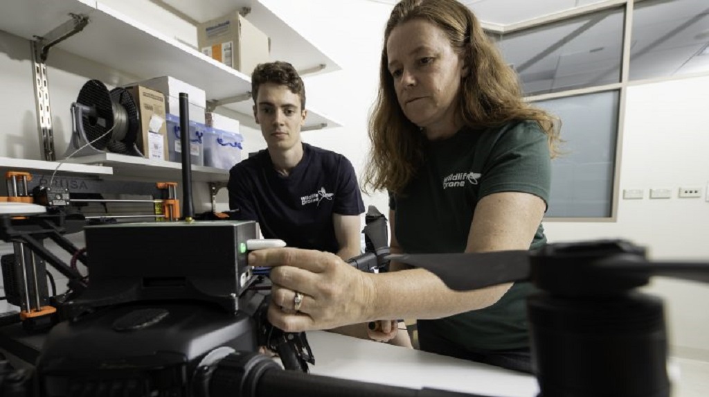 Dr Debbie Saunders and Liam Kennedy setting up the animal-tracking drone in the lab