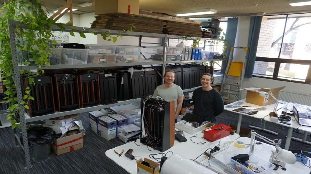 CardCastle's founders in their new offices